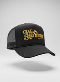 We Hustle Harder Black Trucker Hat